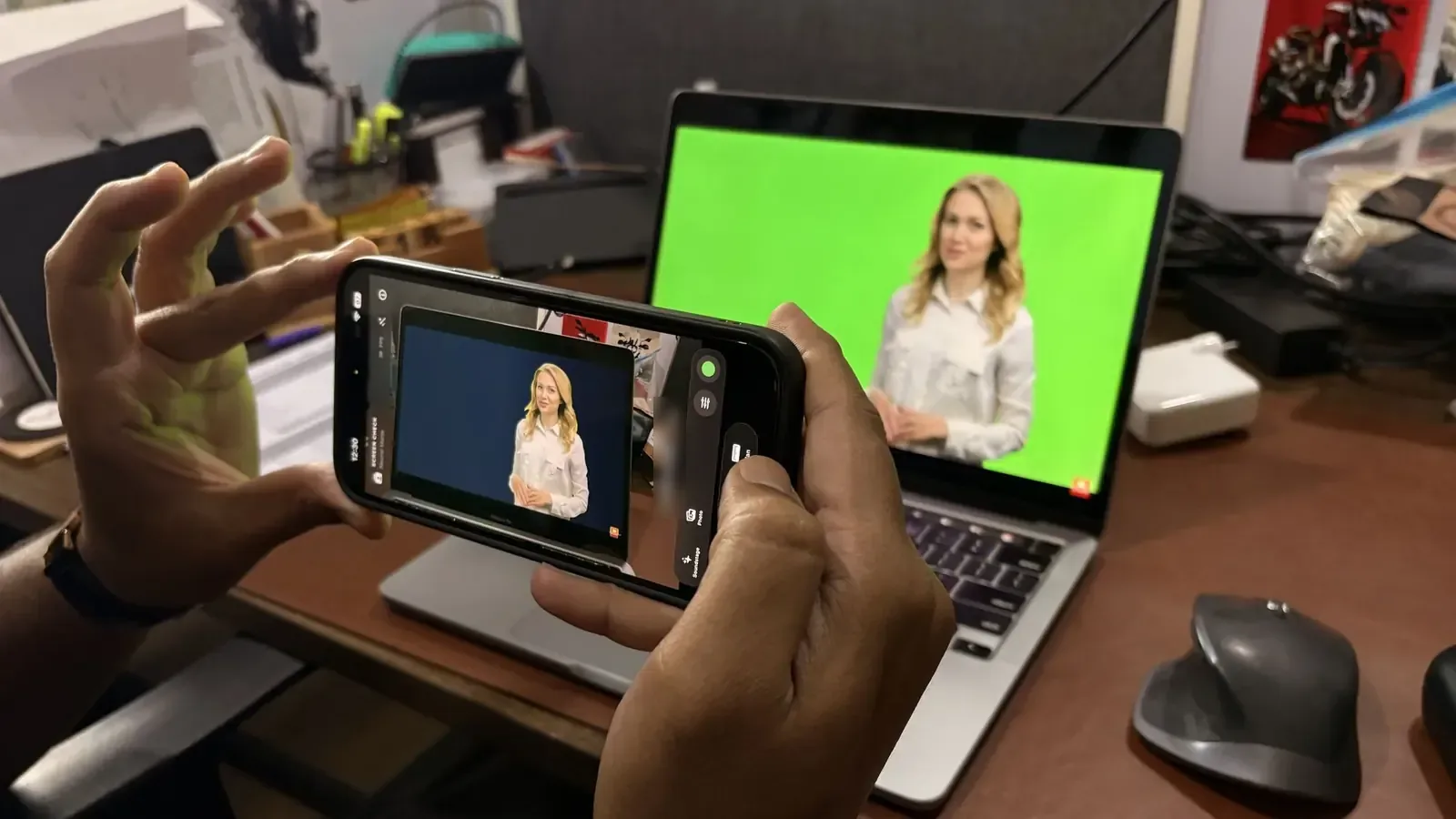 Screen Check showing a live key preview on a phone, against footage on a laptop